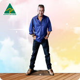 Man in blue shirt and jeans standing on a wooden floor with 'Australian Made' logo in the corner.